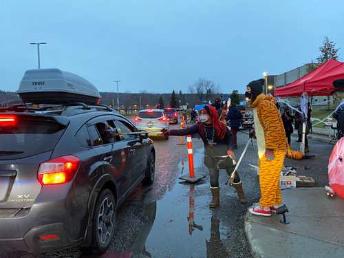 CNC Staff Handing out Candy at Candy Cruise